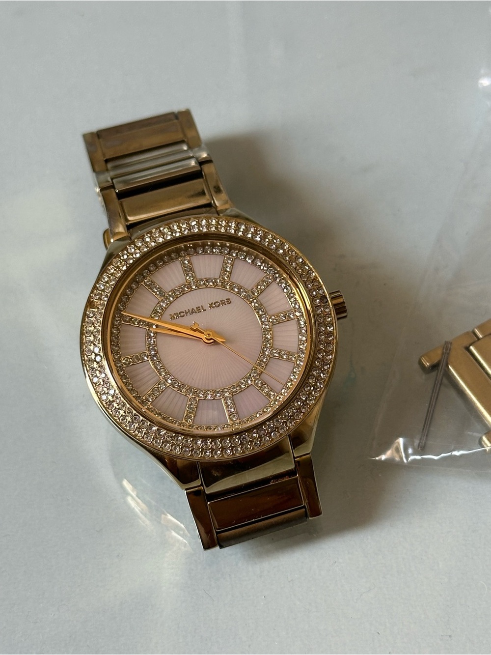 Michael Kors Gold Tone Watch with Pink Dial and Crystal Accents